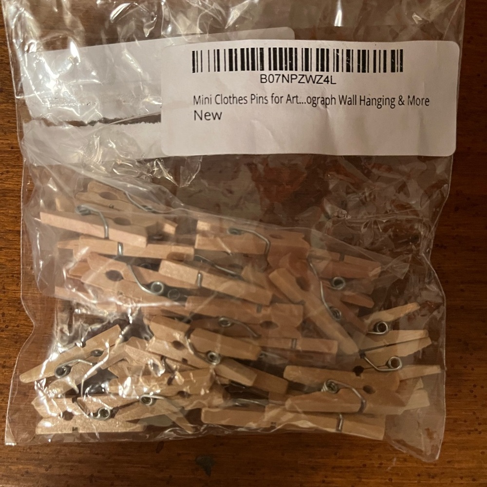 Bag of tiny clothes pins